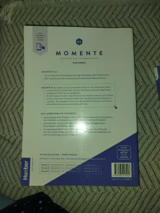 Momente A1: German as a foreign language / work...
