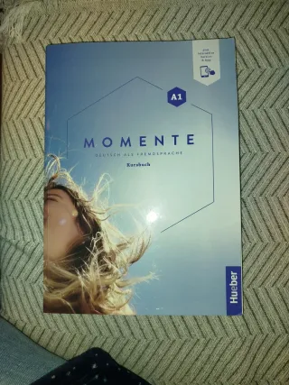 Momente A1: German as a foreign language / work...