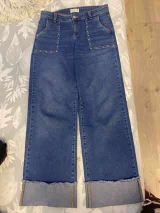 Pantalones vaqueros anchos con tachuelas