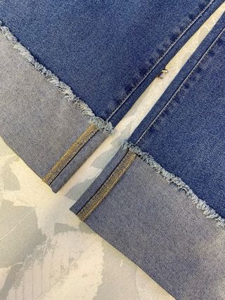 Pantalones vaqueros anchos con tachuelas