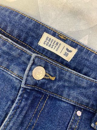 Pantalones vaqueros anchos con tachuelas