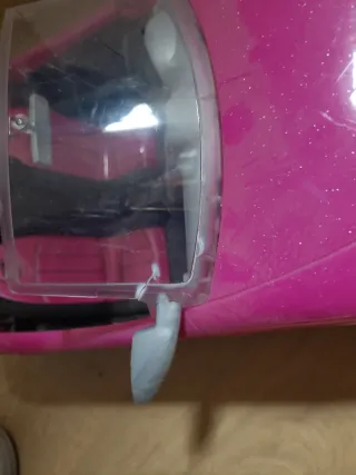 Coche rosa Barbie descapotable.