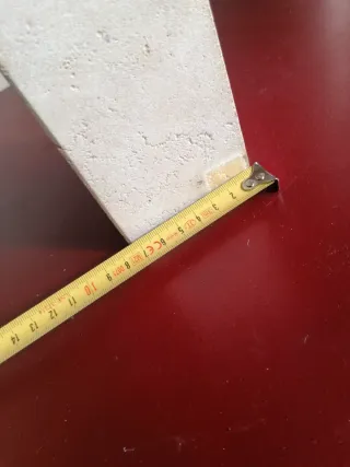 Busto de bronce y piedra