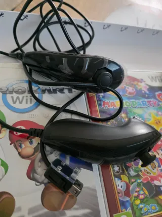 Consola Nintendo Wii Negra y 3 juegos