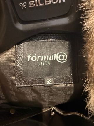 Abrigo de cuero con cuello de pelo