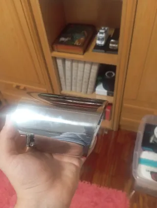 Cola de escape cromada