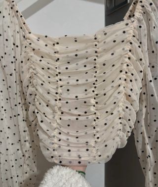 Top transparente lunares manga larga