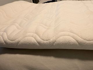 Cuna de viaje y colchón