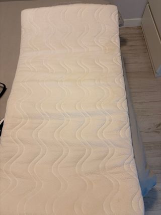 Cuna de viaje y colchón