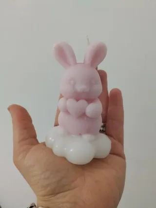 Candela coniglio rosa su nuvola