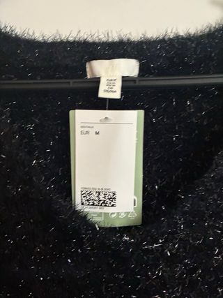 Jersey H&M brillos negro y plata Talla M