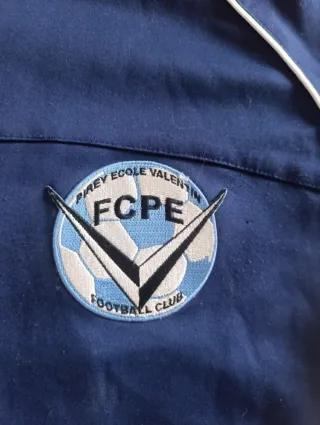 Chaqueta deportiva Kappa azul y blanca