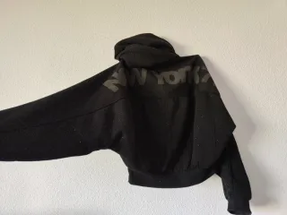 Sudadera con purpurina negra Zara