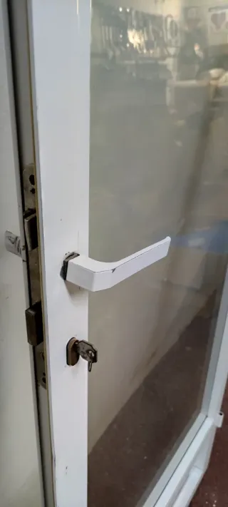 PUERTA DE ALUMINIO SIN MARCO CON CRISTAL CLIMALIT