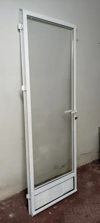 PUERTA DE ALUMINIO SIN MARCO CON CRISTAL CLIMALIT