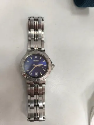 Reloj Titan Azul y Plateado