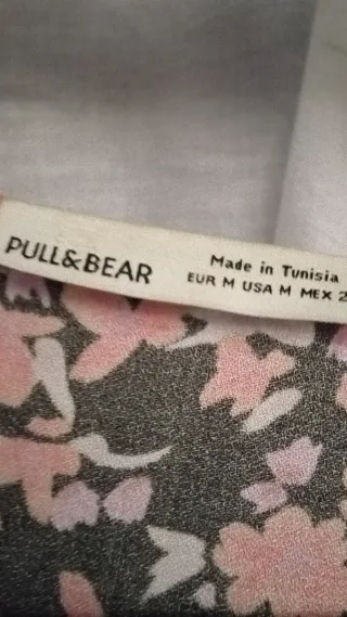 Vestido negro con flores naranja