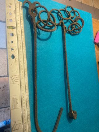 Antiche catene da camino in ferro
