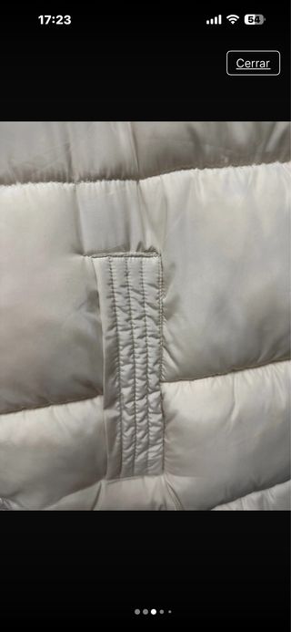 Chaleco reversible beige y plateado