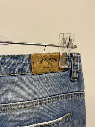 Calças ganga claras com rasgões XS