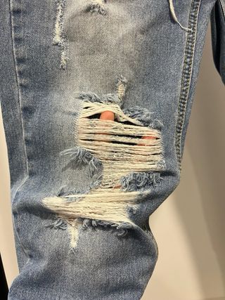 Calças ganga claras com rasgões XS