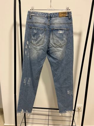 Calças ganga claras com rasgões XS