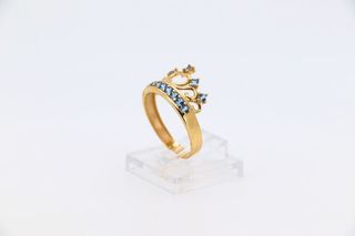 ANILLO GRANDE CORONA CIRCONITAS AZULES. Oro 18k. P