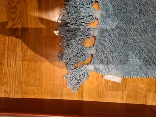 Alfombras azul claro con flecos