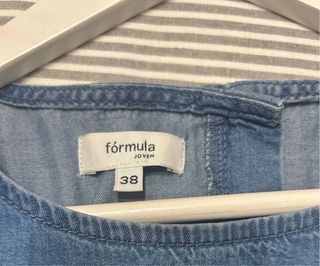 Camisa vaquera manga larga con volantes