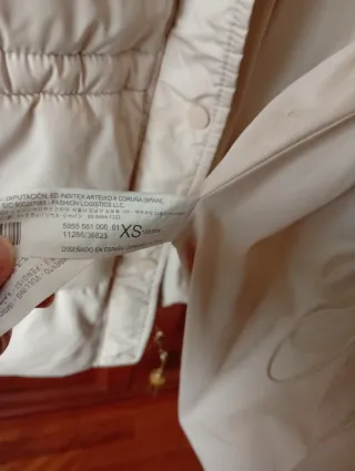 Chaleco acolchado y bolso Stradivarius