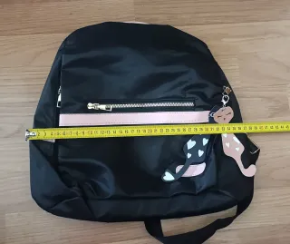 Mochila antirrobo negra y rosa