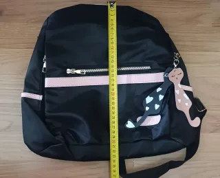 Mochila antirrobo negra y rosa