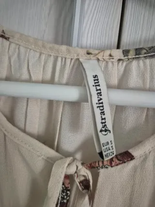 Blusa floral manga larga talla S