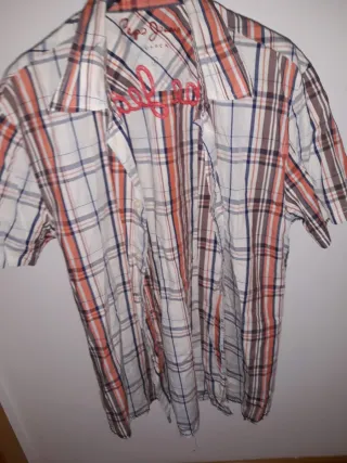 Camisa de cuadros naranja y blanca