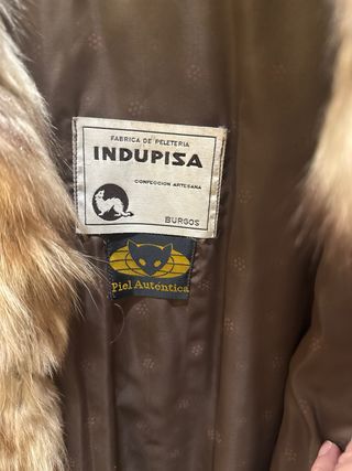Abrigo de piel auténtico