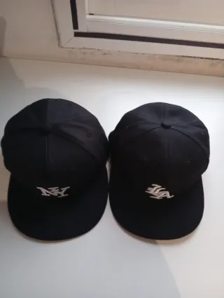 Confezione 2 Cappelli NY e LA Nere