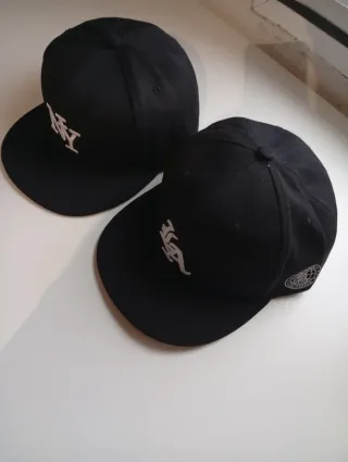 Confezione 2 Cappelli NY e LA Nere