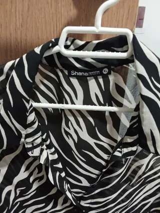 Blusa  Animal Print Talla M