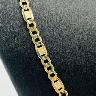 Cadena Figaro Labrada 3x1 7mm 18K