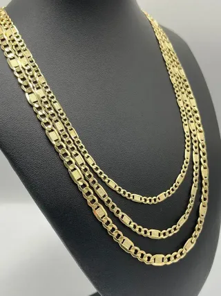 Cadena Figaro Labrada 3x1 7mm 18K