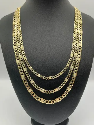 Cadena Figaro Labrada 3x1 7mm 18K