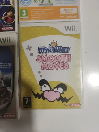 Nintendo Wii con 2 mandos y 5 juegos