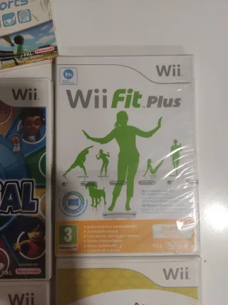 Nintendo Wii con 2 mandos y 5 juegos
