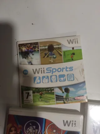Nintendo Wii con 2 mandos y 5 juegos