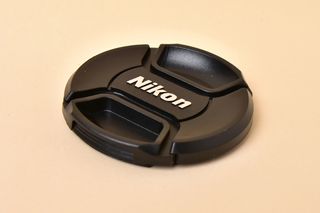 Tapa Objetivo Nikon LC-62