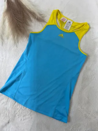 Camiseta deportiva Adidas azul y amarilla Talla xs