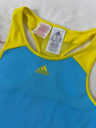 Camiseta deportiva Adidas azul y amarilla Talla xs