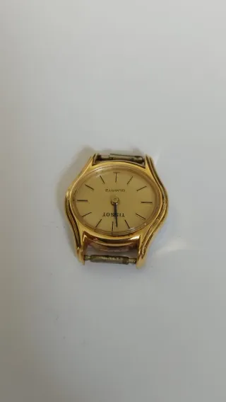 Reloj Tissot de cuarzo para dama, no funciona