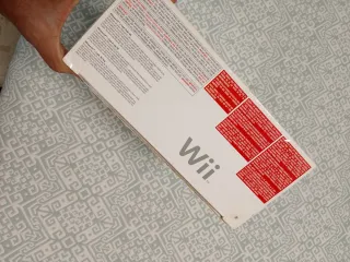 Nintendo Wii + Caja + Wii Sports