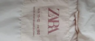 Abrigo acolchado rosa Zara para niña.